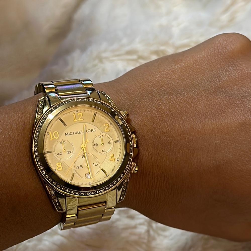 Michael Kors women’s gold watch